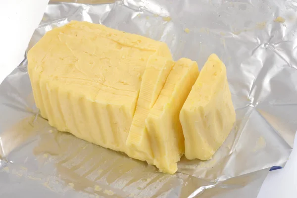Manteiga Cortada Papel Embrulho Close — Fotografia de Stock