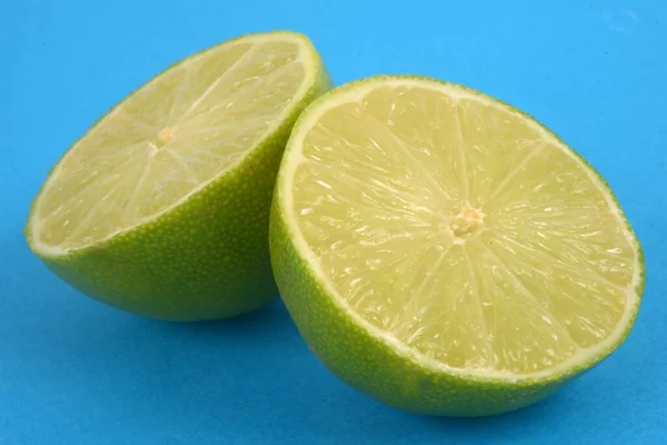 Lime Cut Half Close Blue Background — Stock Photo, Image