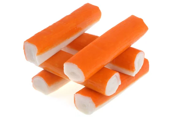 Surimi Sticks Empilhados Perto Fundo Branco — Fotografia de Stock