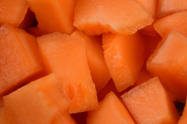 Fresh and organic melon pieces close up