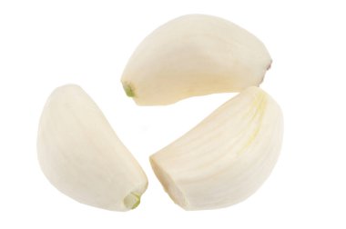 Garlic cloves close up on white background