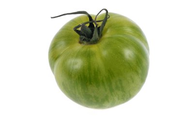 Beyaz arkaplanda yeşil zebra domatesi. 