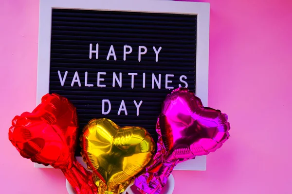 Greeting Card Valentine Day Pink Background Foil Hearts Balloons Chocolates — Stock Photo, Image