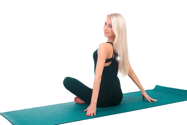 Woman practicing yoga — Stock Photo, Image