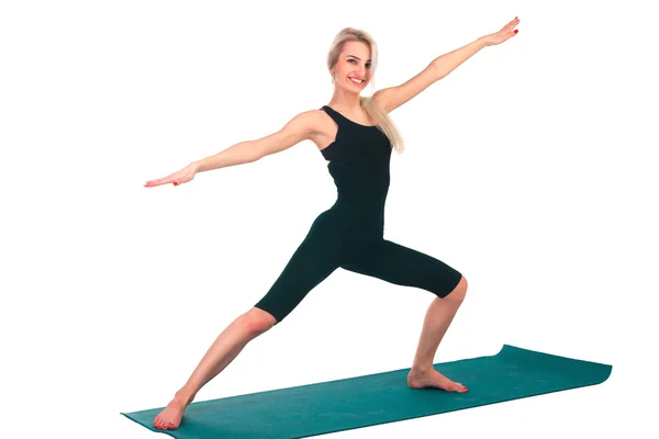 Woman practicing yoga — Stock Photo, Image