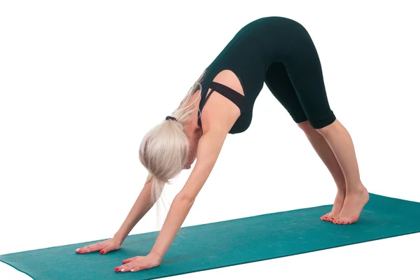 Woman practicing yoga — Stock Photo, Image