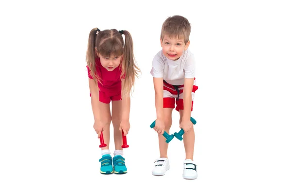 Young children with dumbbells — Stock Photo, Image