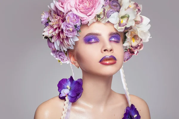 Elegant Girl with wreath on head and makeup in purple tones — Stock Photo, Image