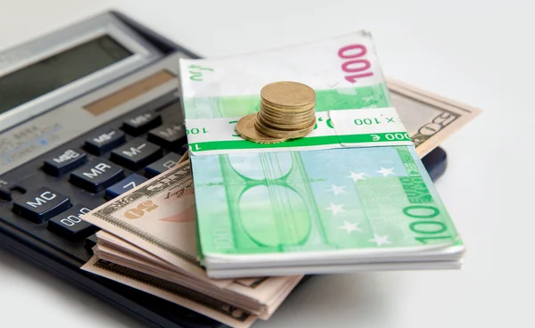 Moneys lie on a calculator — Stock Photo, Image