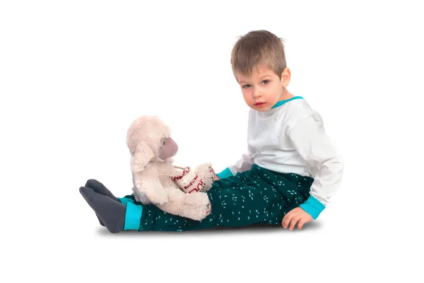 Menino com um brinquedo de pelúcia — Fotografia de Stock