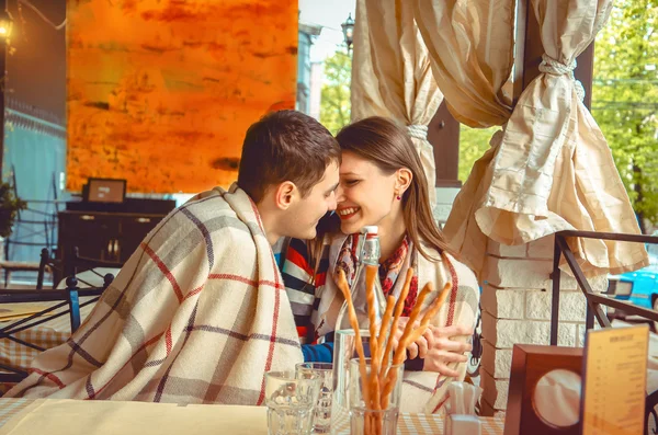 Couple flirting and kisses at the date — Stock Photo, Image