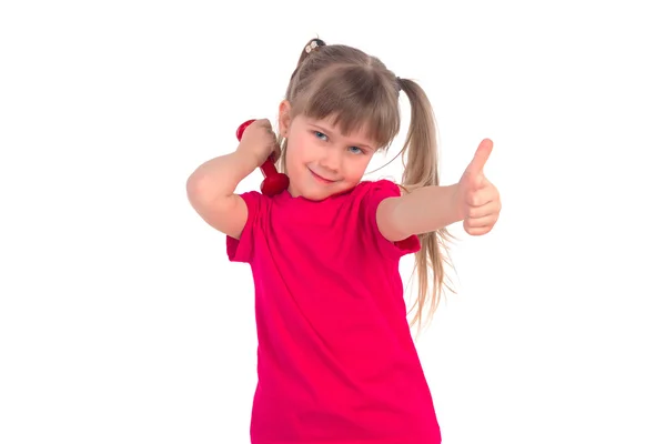 Little girl with a dumbbell — Stock Photo, Image