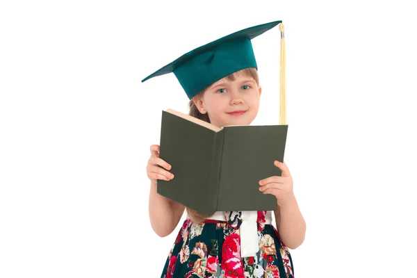 女孩在一顶帽子，拿着一本书 — 图库照片