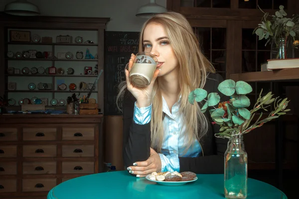 Beautiful girl with cup of coffee — Stock Photo, Image