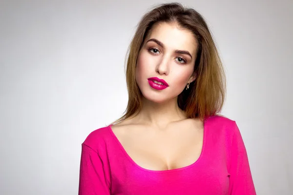 Girl with pink lips in studio — Stock Photo, Image
