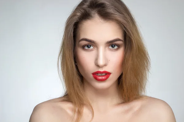 Portrait of young girl with red lips — Stock Photo, Image