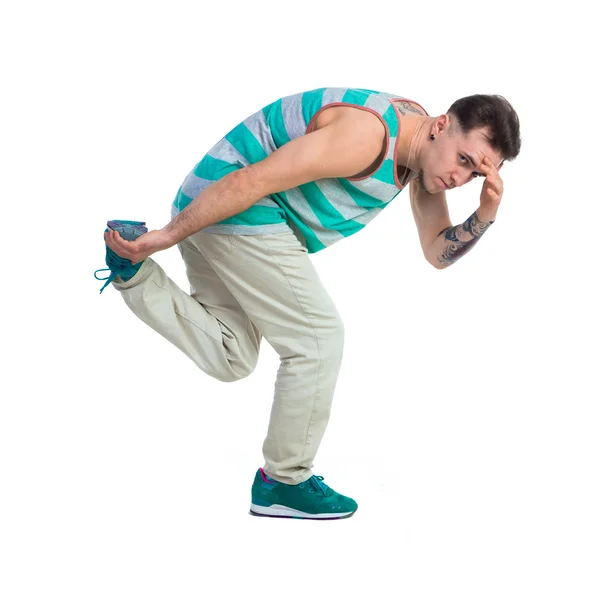 Man posing on one leg — Stockfoto