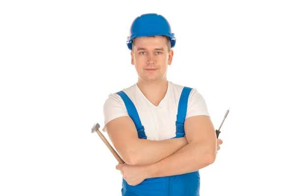 Hombre constructor mirando a la cámara en uniforme azul — Foto de Stock