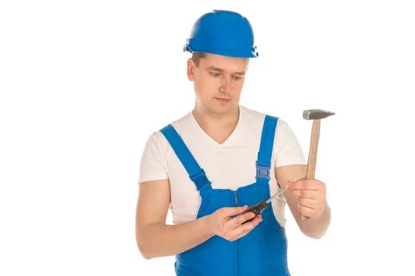 Manliga builder i blå uniform och hjälm — Stockfoto