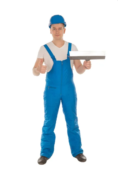 Joven constructor masculino con cuchillo de masilla — Foto de Stock