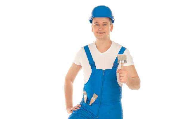 Builder in blue uniform and helmet — Stock Photo, Image