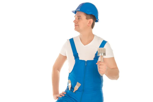 Builder i blå uniform och hjälm — Stockfoto