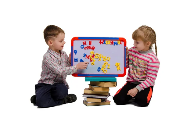 Niño y niña aprender alfabeto —  Fotos de Stock