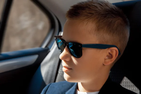 Young stylish boy in sunglasses — Stock Photo, Image