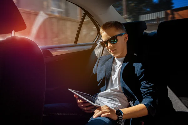 Serious young boy in sunglasses — Stock Photo, Image
