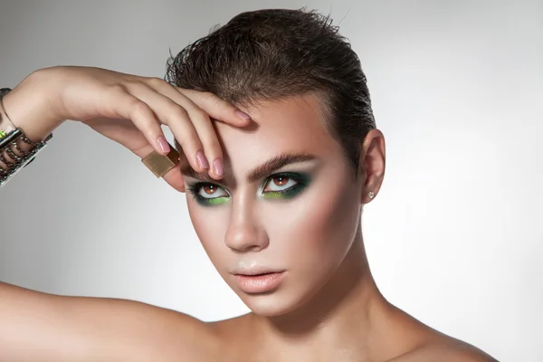 Horizontal portrait of young beauty girl with green colors makeu — Zdjęcie stockowe