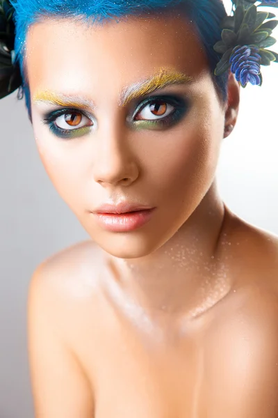 Vertical portrait of beautiful girl with multicolor makeup and b — Stock Photo, Image