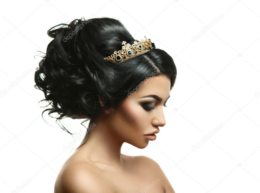 Profile portrait of beauty young brunette with creative hairstyl