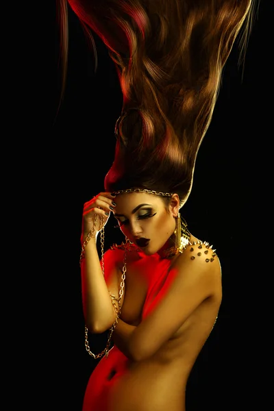 Sexual adult fashion woman with high creative hairstyle and gold — Stock Fotó