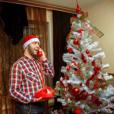 Hipster telefon neşeli Noel ve a mutlu yeni yıl tebrik