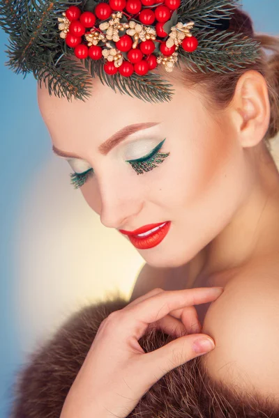 Shy young woman with wreath on head and closed eyes — Stock Photo, Image