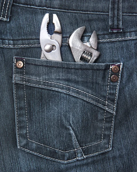 Achterzijde jeans zak met tools — Stockfoto