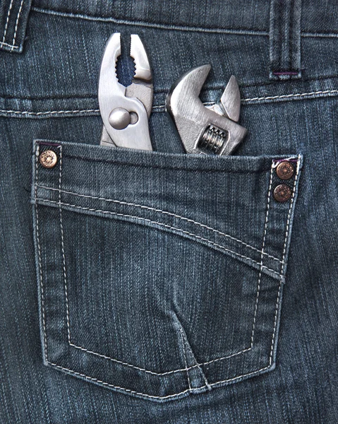 Achterzijde jeans zak met tools Rechtenvrije Stockfoto's