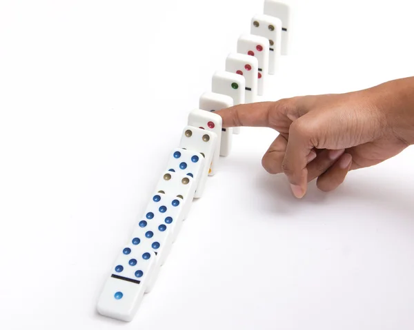 Person stopping the domino effect — Stock Photo, Image