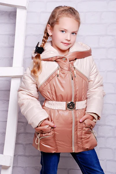 Little girl in autumn warm coat — Stock Photo, Image