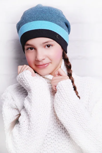 Adorable smiling girl in warm hat — Stock Photo, Image