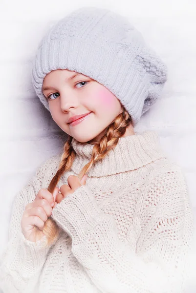 Child girl wearing knitted hat — Stock Photo, Image