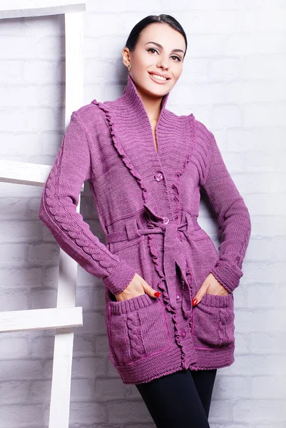 Pretty woman in knitted cardigan — Stock Photo, Image