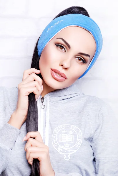 Pretty woman in headband — Stock Photo, Image