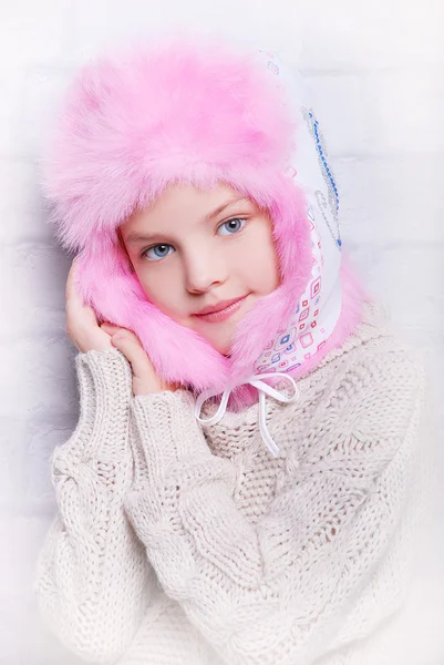 Smiling girl in warm winter hat — Stock Photo, Image
