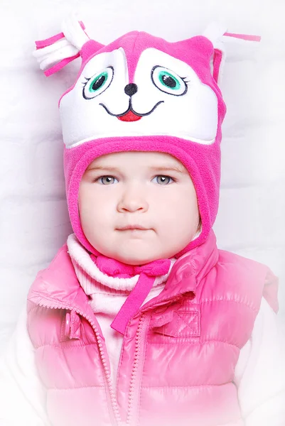 Adorable child girl in warm hat — Stock Photo, Image