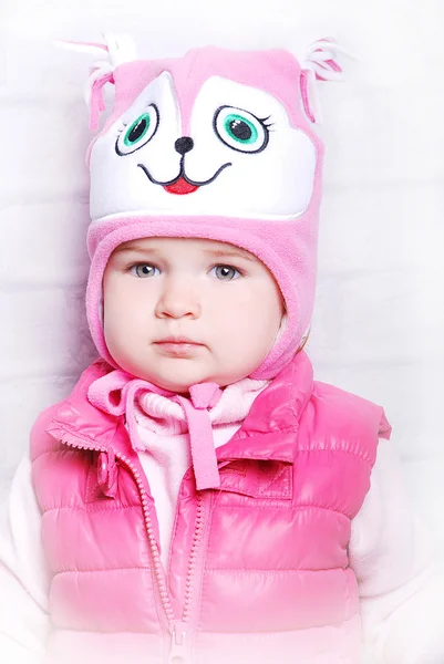 Adorable child girl in warm hat — Stock Photo, Image