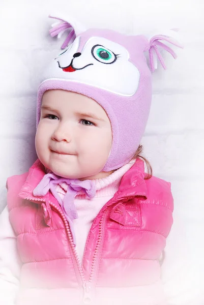 Adorable child girl in warm hat — Stock Photo, Image