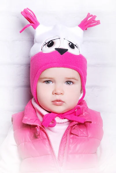 Child girl in warm knitted hat — Stock Photo, Image