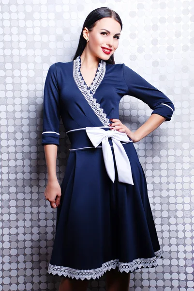 Brunette woman in stylish dress — Stock Photo, Image