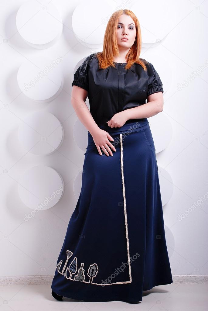 Plus size woman in stylish dress